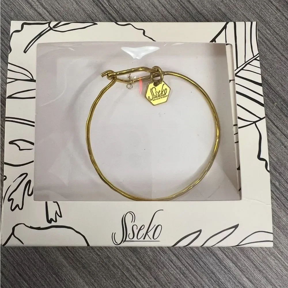 Sseko Designs Brass Charm Bangle Bracelet – Fair‎ Trade Jewelry - Picture 2 of 3